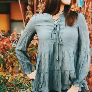 Long sleeve tiered top with tie front